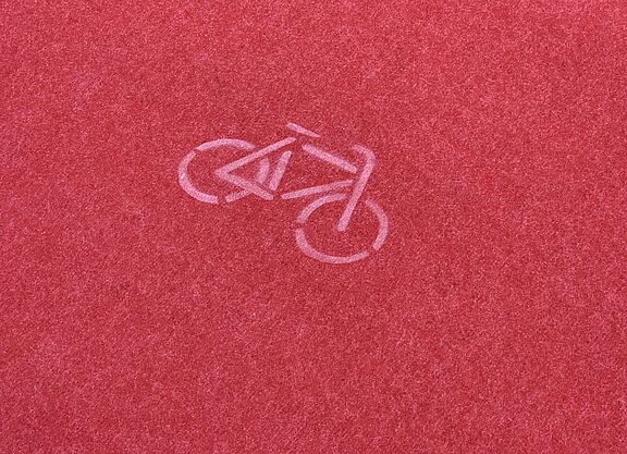 Fahrradsymbol Roter Teppich mit Fahrradsymbol